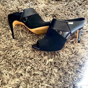 Cute heels, worn once. Now too small.